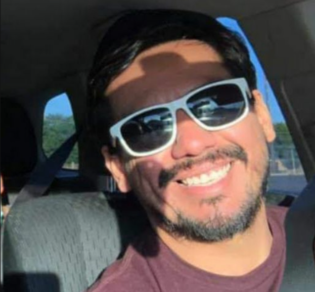 Ern smiling in sunglasses